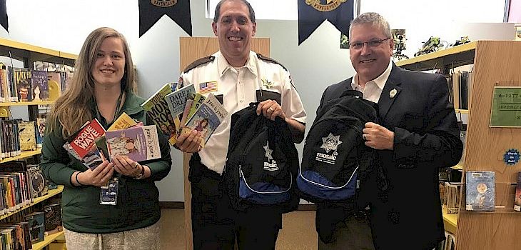Sheriff’s Dept. Now Carrying a Backpack Full of Books in Their Squad Cars
