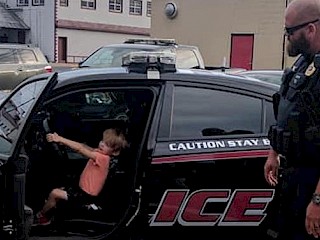 Spooner Police Officers Spend Quality Time with Special Boy Article Image