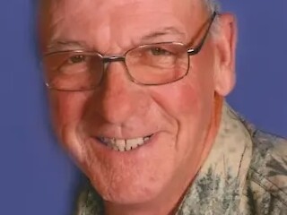 John D. Holst Obituary