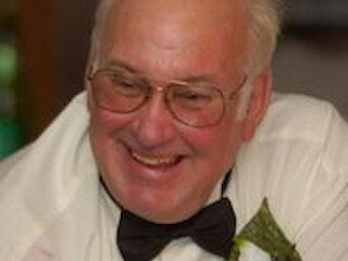 John E. Rust Obituary